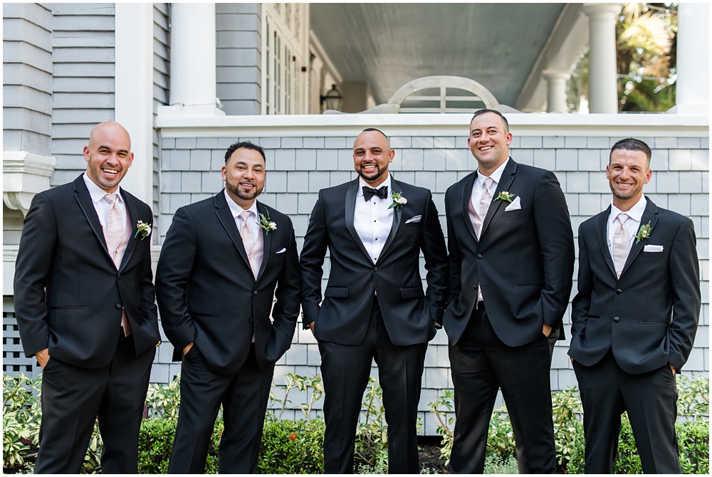 groomsmen laughing at Tampa wedding