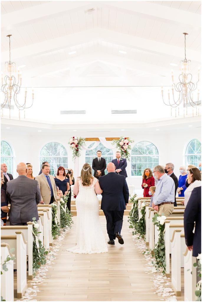 father walking daughter down the aisle at harborside chapel 