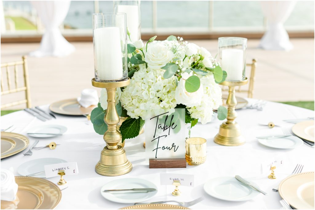 clearwater beach wedding reception table with gold chairs