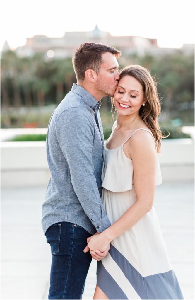 this is a couple kissing at a tampa river center engagement session