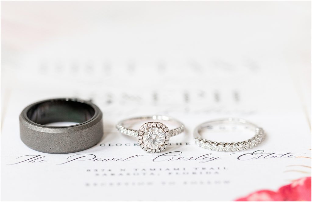 this is a photo of rings on a wedding invitation at powel crosley estate
