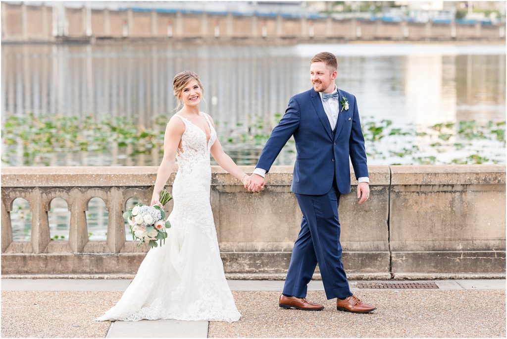 bride and groom walking at lakeland florida wedding