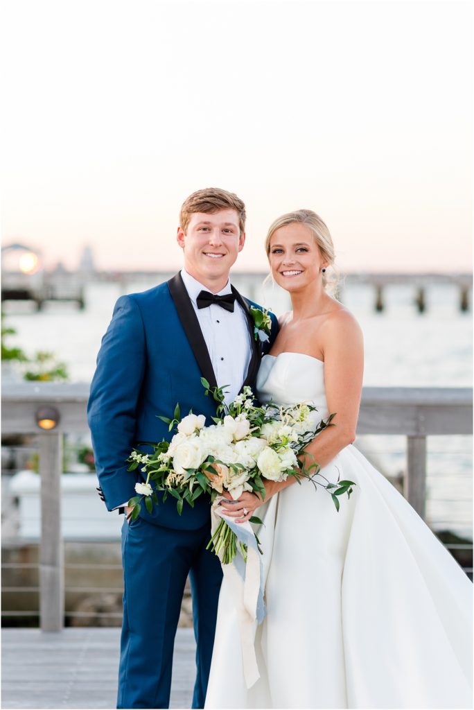 bride and groom smiling at tampa yacht club