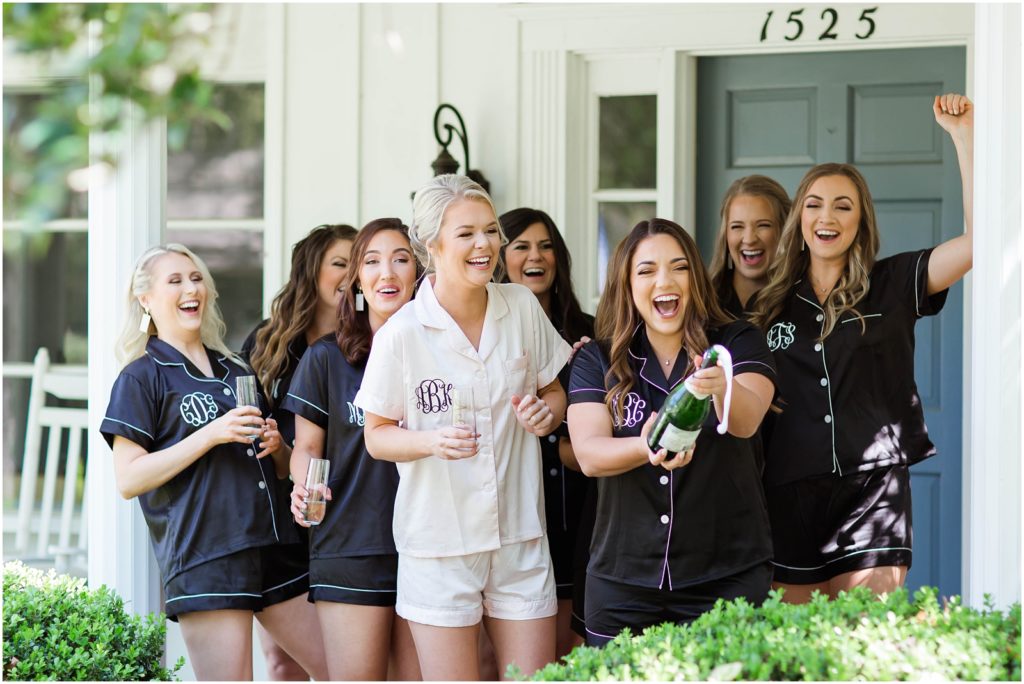 girls popping champagne at college of central florida